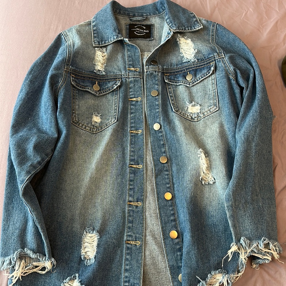 Long jean jacket worn once size S brand is American bazi denim jeans